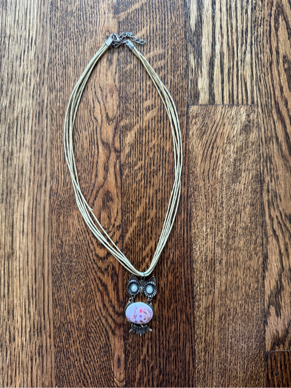 Multi-Strand Cream Necklace with Owl Pendant